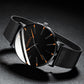 Reloj ultrafino de cuarzo simple y elegante con correa de malla de acero inoxidable.